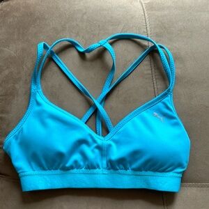 Puma sports bra size XS Tiffany blue crisscross back